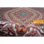 فرش گرد سرمه ای طرح ریزماهی4